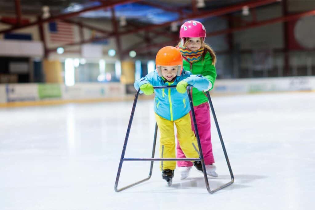 Two Toddlers Ice Skating