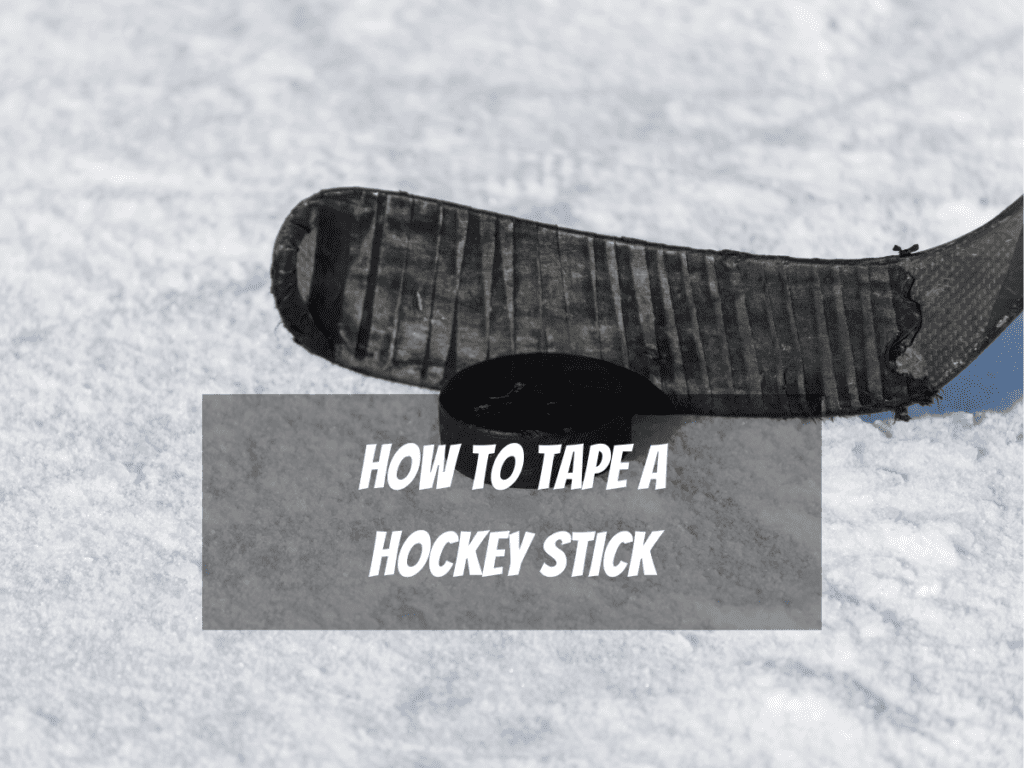 Hockey Stick With Black Tape About To Hit A Puck Is A Good Example Of How To Tape A Hockey Stick