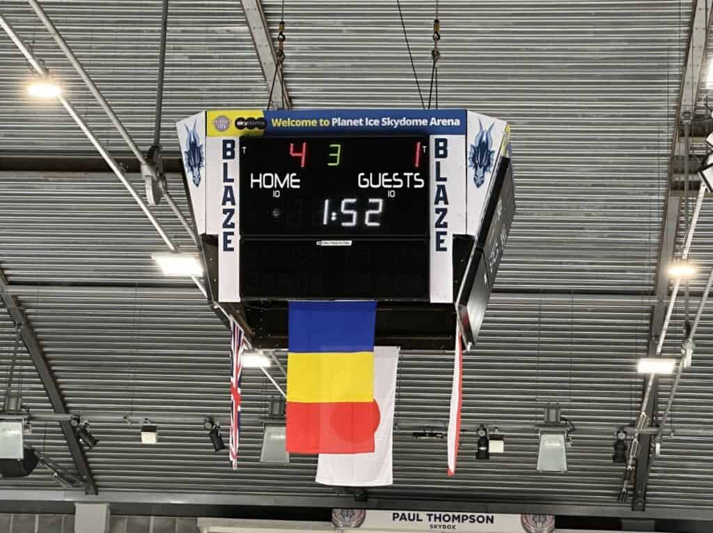 A Score Clock At An Ice Hockey Game Shows The Home Team Is Winning