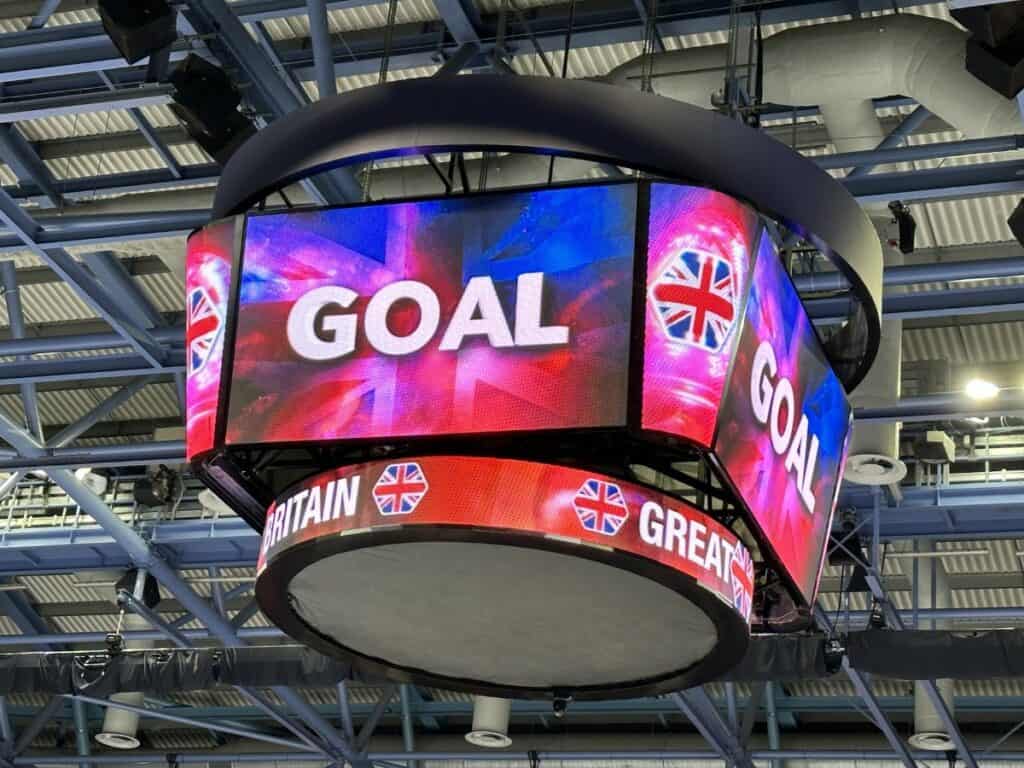 A Jumbotron Announces A Goal During An International Ice Hockey Game. Time To Chirp The Goalie.