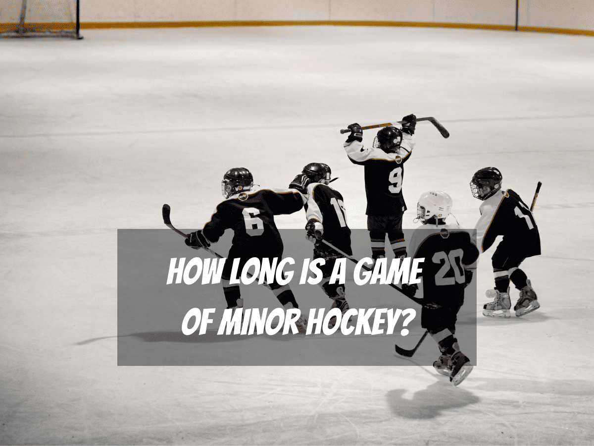 Five Minor Hockey Players In Black And White Jerseys Celebrate On The Ice How Long Is A Game Of Minor Hockey?