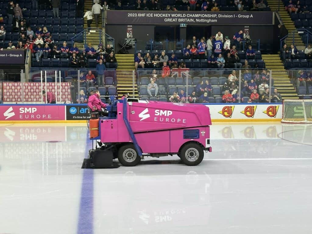 A Pink Zamboni Cleans The Ice During The Intermission Of An Ice Hockey Game In The UK - How long is a hockey game