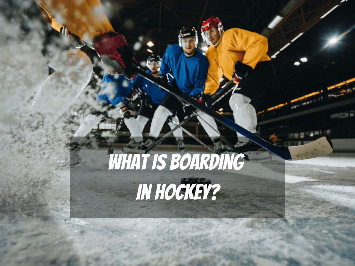 Five Ice Hockey Players Fight For The Puck During A Hockey Game At Night What Is Boarding In Hockey