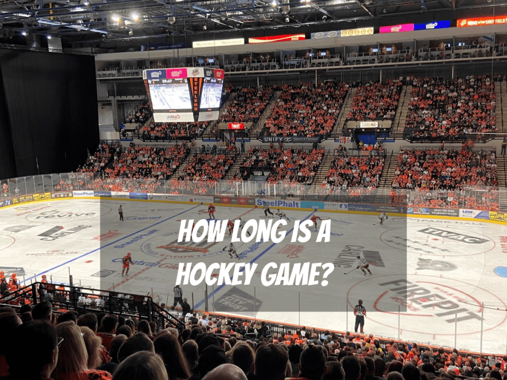 A Large Crowd Of Hockey Fans Watch A Hockey Game As Ice Hockey Players Skate On The Ice How Long Is A Hockey Game?